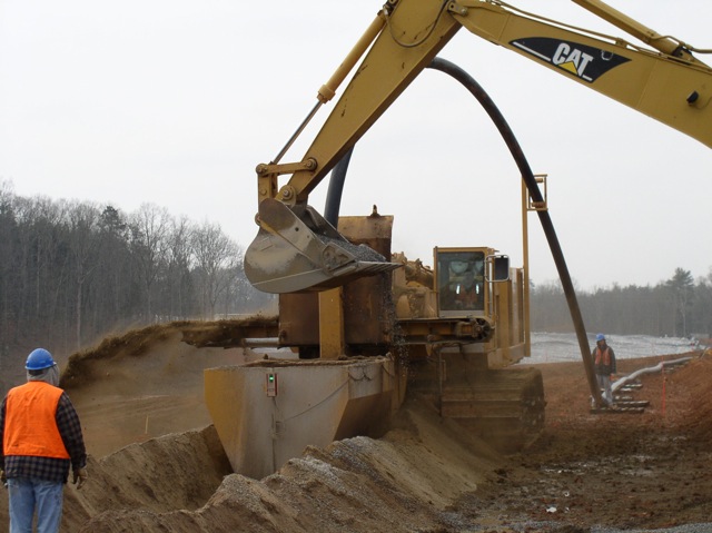 Dewind_One_Pass_Trenching_Stone_Backfill